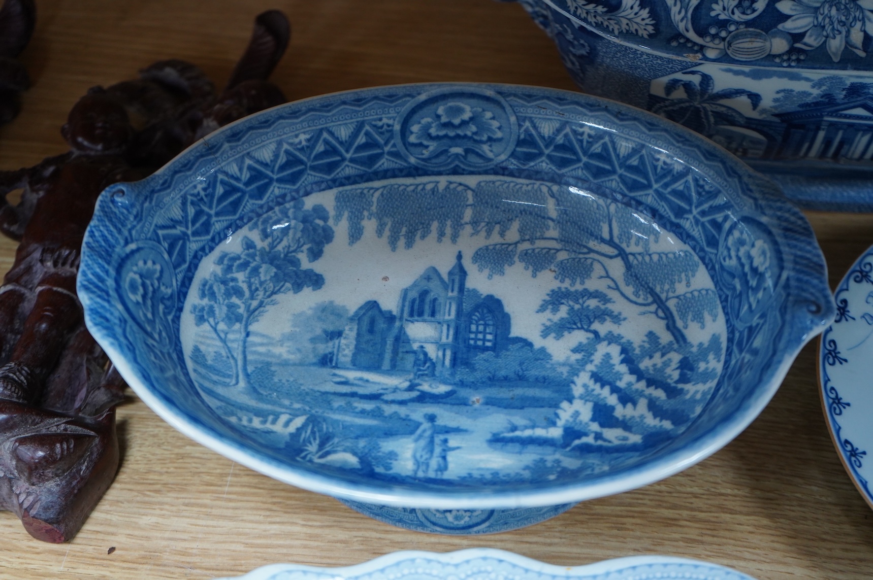 A group of Victorian blue-printed dinner wares, including a Chinese blue and white dish and a Wade bird (13).